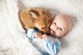 犬は人間の赤ちゃん…の画像